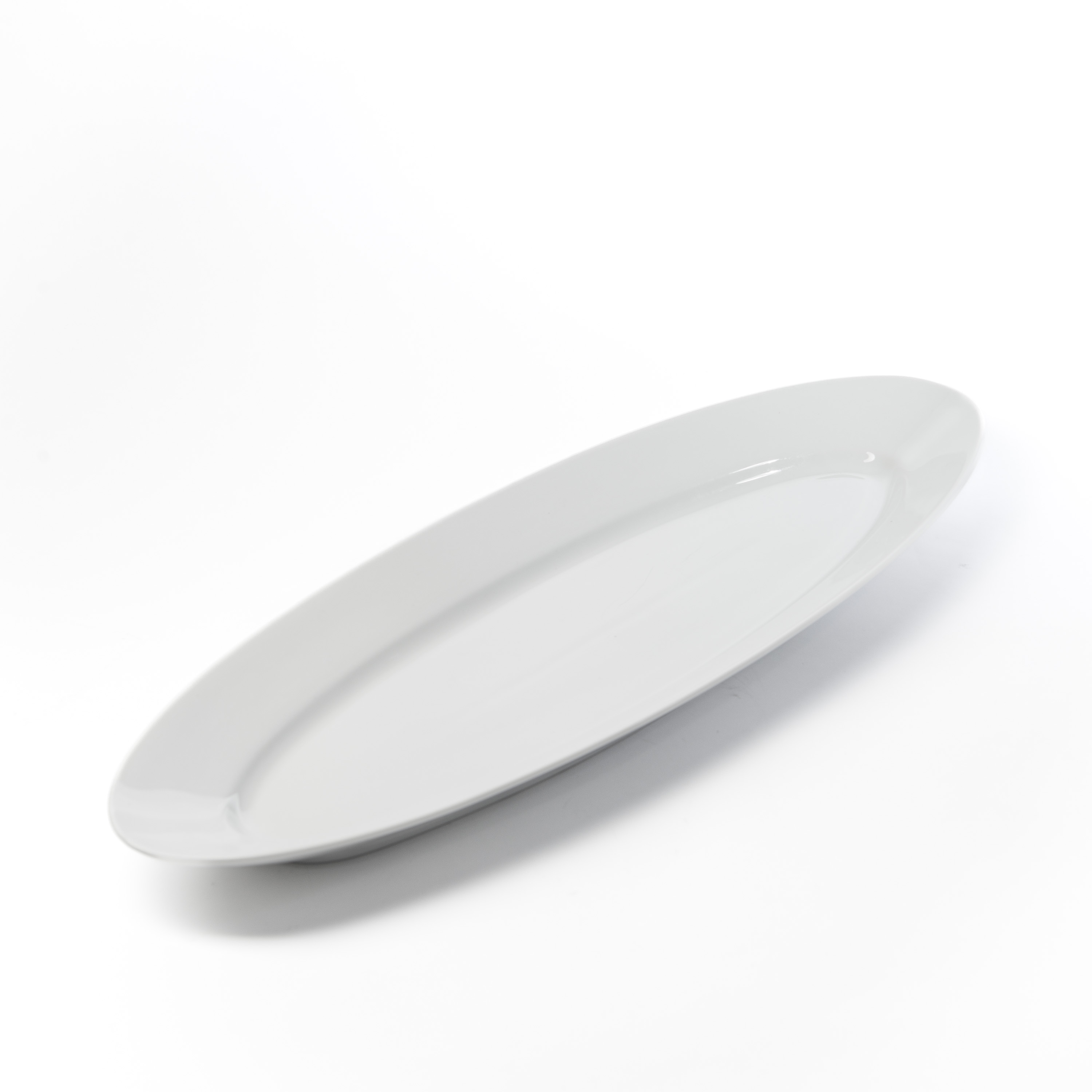 Photo de Plat allongé en porcelaine 59 x h 3 x 21 cm